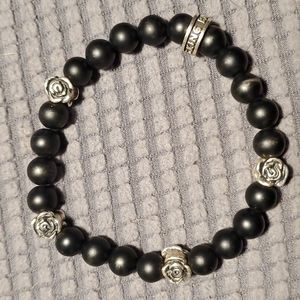 King Baby bracelet with sterling roses & onyx beads.